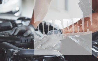 Auto mechanic working in garage. Repair service